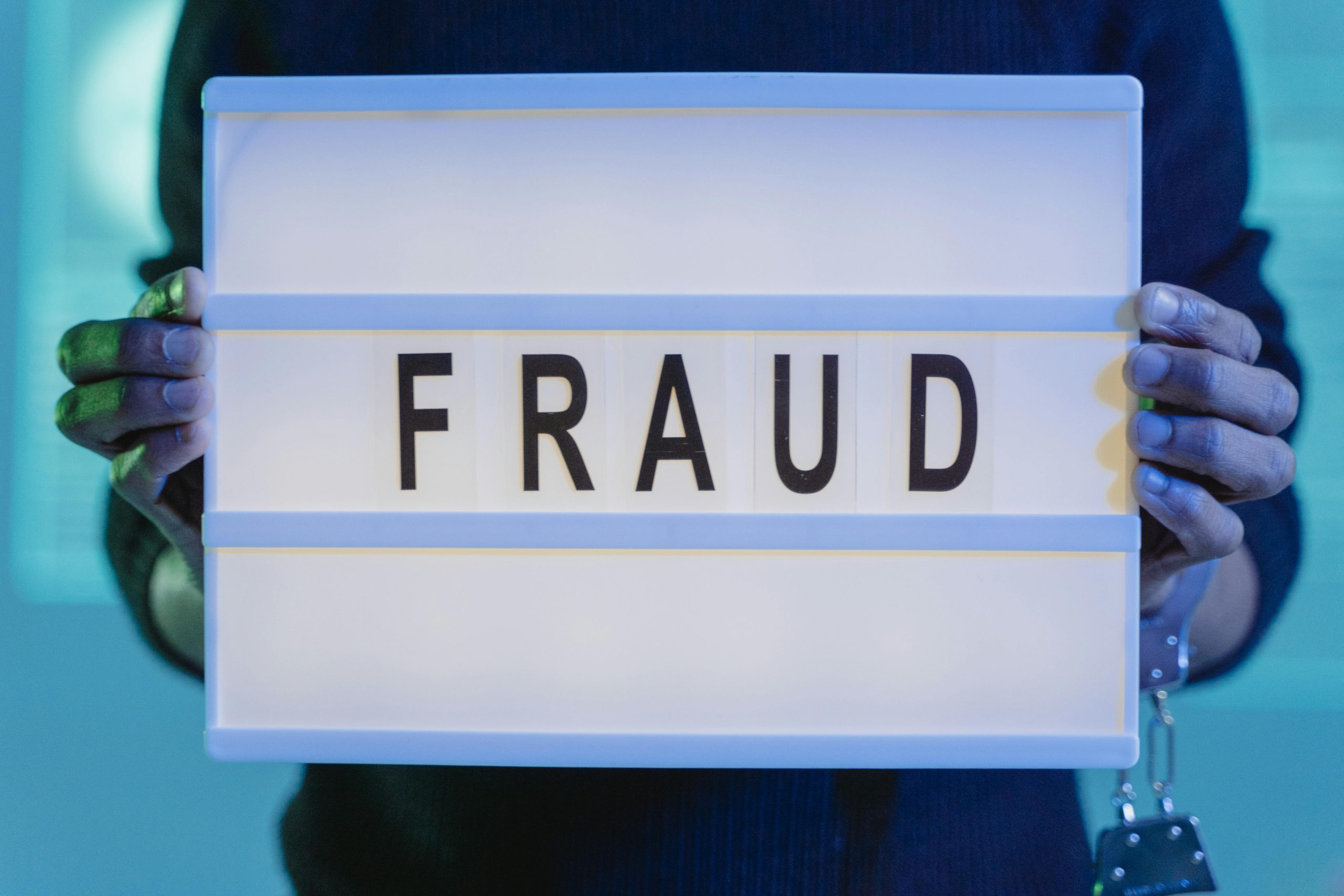 illuminated fraud sign